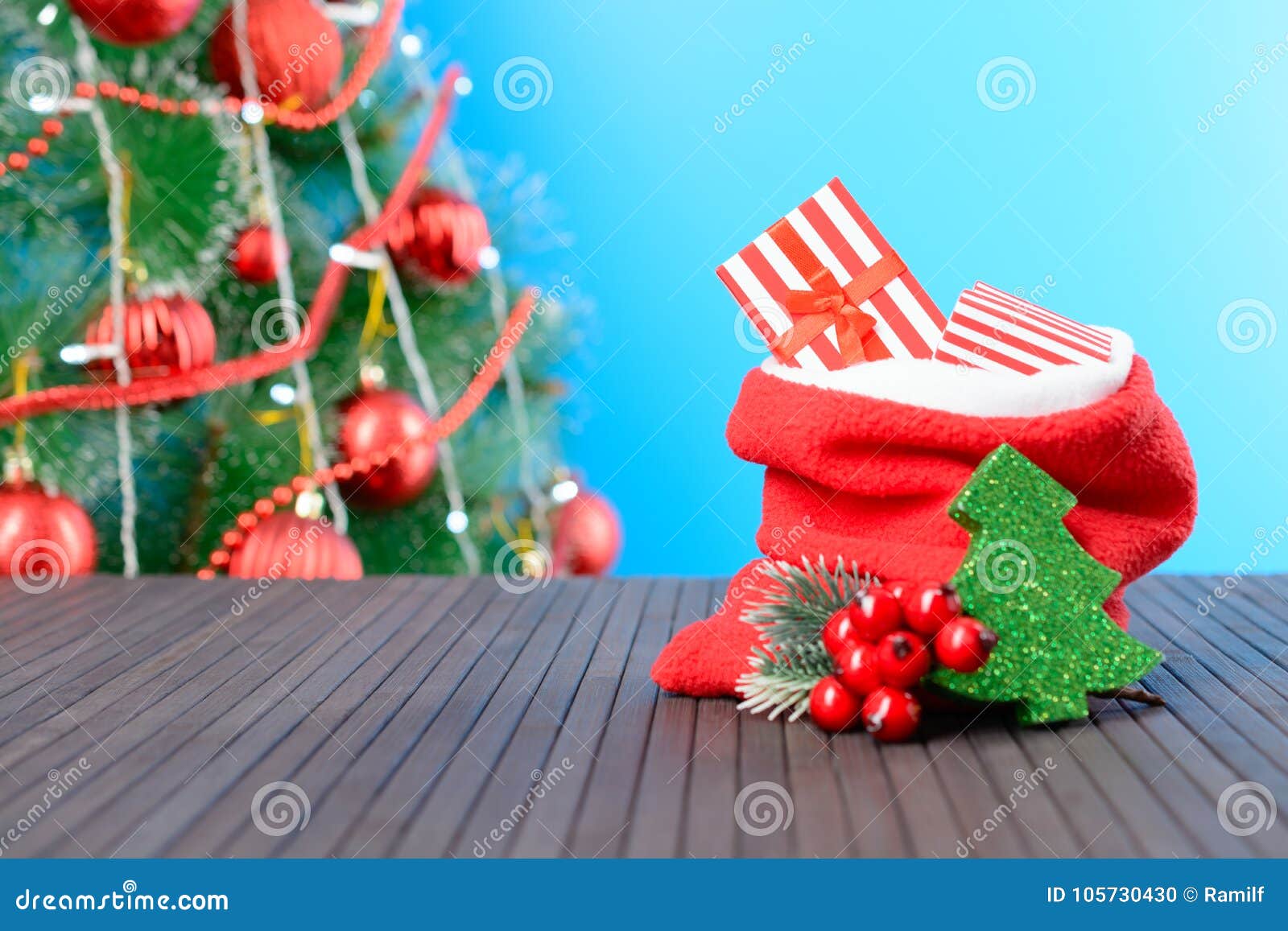 Presents in bag on table stock photo. Image of studio - 105730430