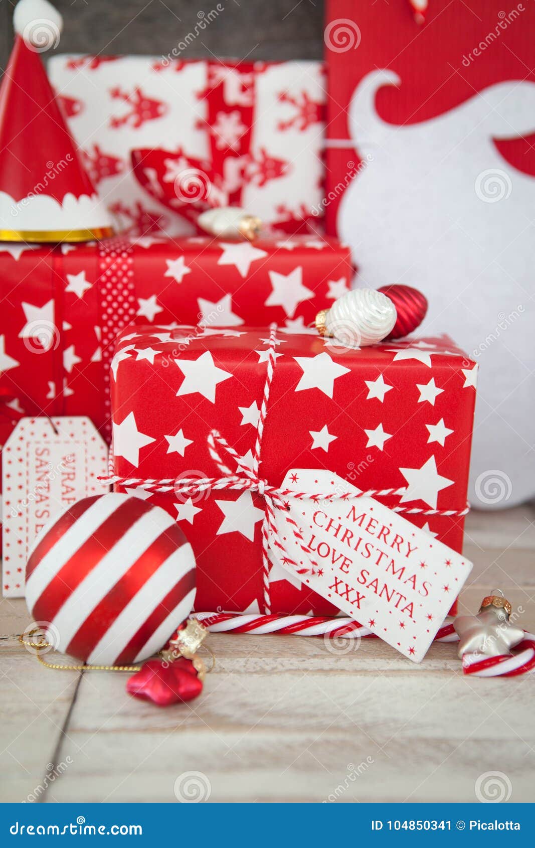 Presents in Red and White Wrapping Paper Stock Image - Image of ornaments,  holidays: 104850341