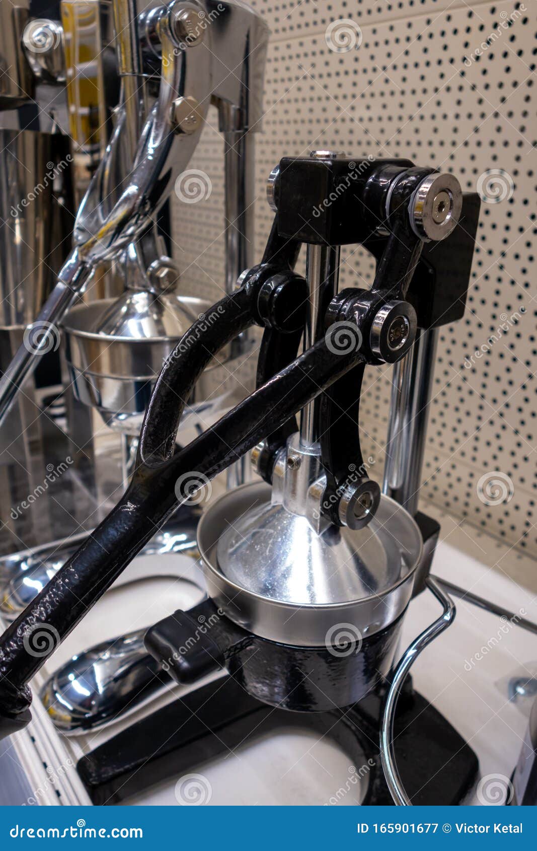 Press for Citrus. Professional Stainless Steel Juicer. Stock Image