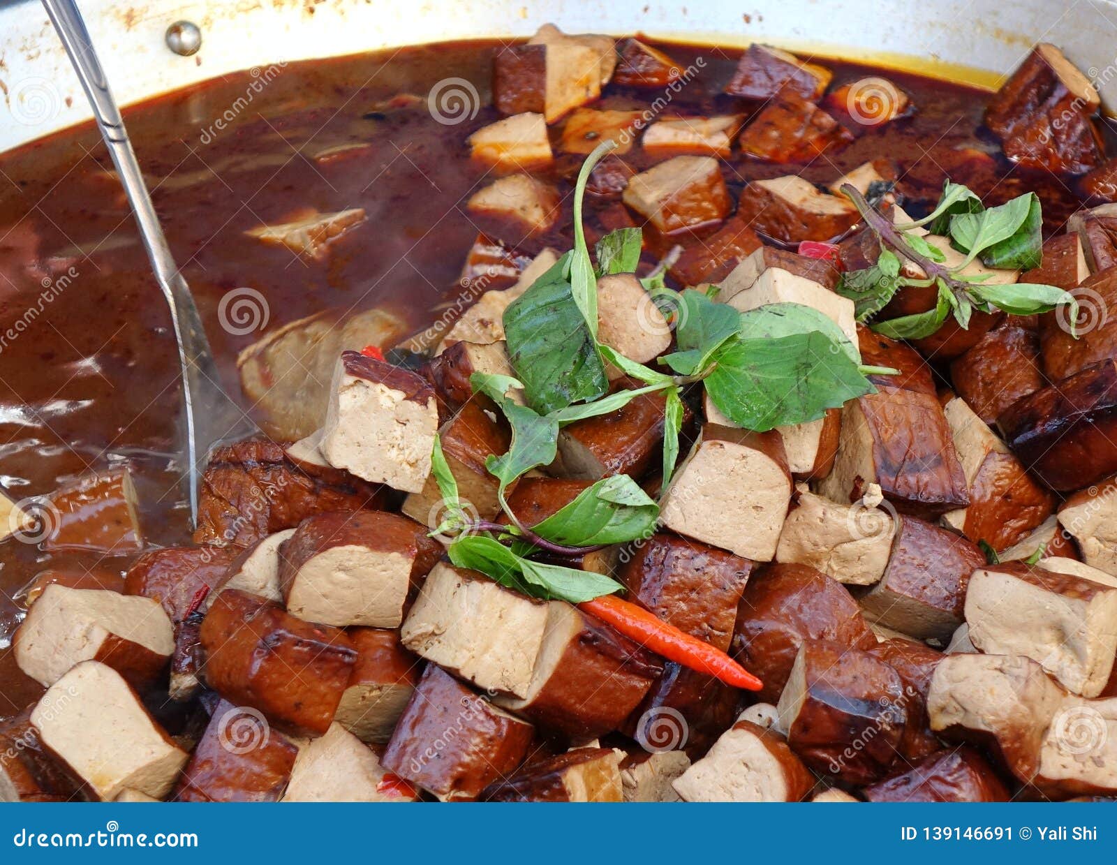 Pressed Tofu Cooked in Sauce Stock Image - Image of food, cooking