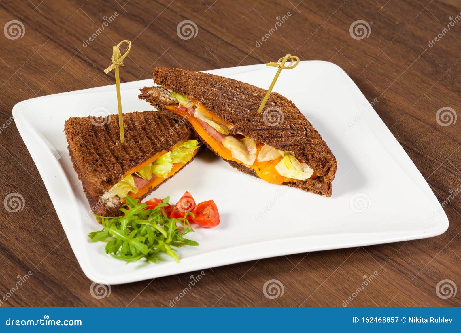 Pressed and Toasted Double Panini with Ham and Cheese Served on