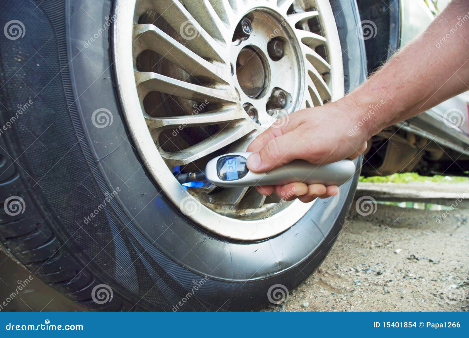 Pressure check in a wheel stock photo. Image of connect 15401854