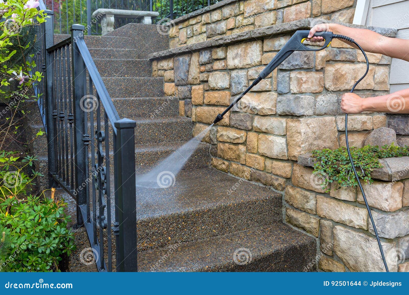 pressure power washing the front entrance stair steps