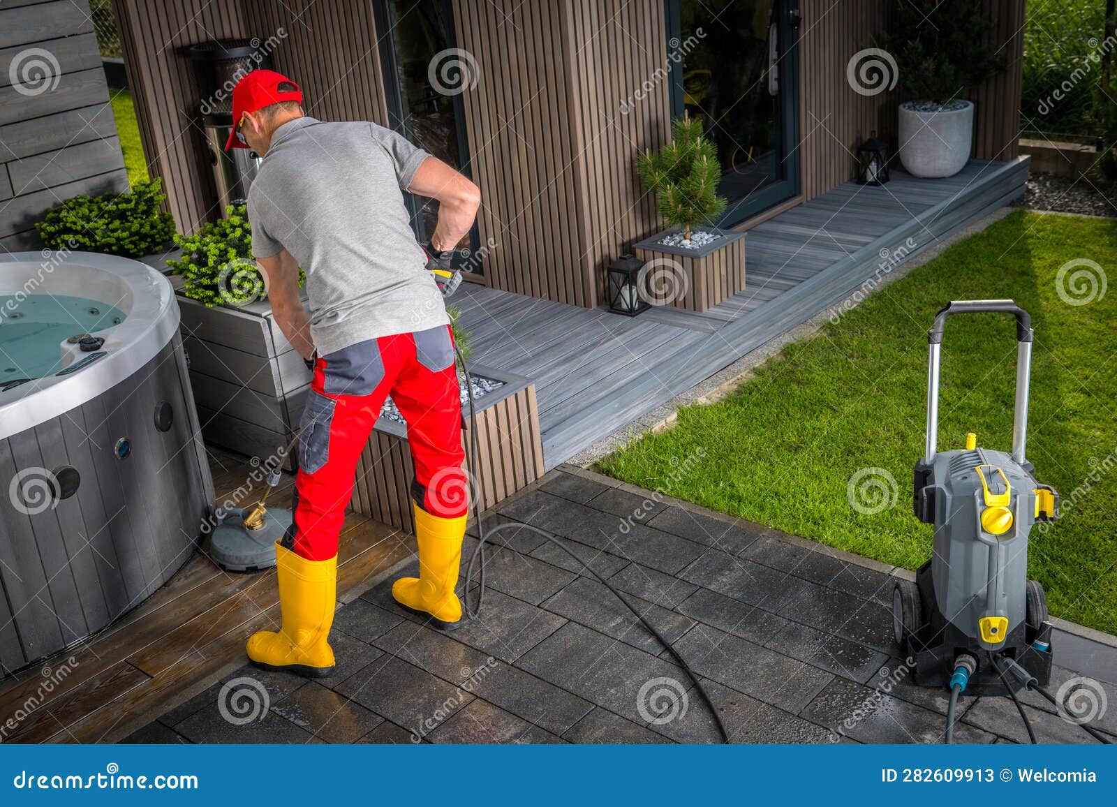 Pressure Washing Concrete Bricks Patio Using Washer Surface Attachment