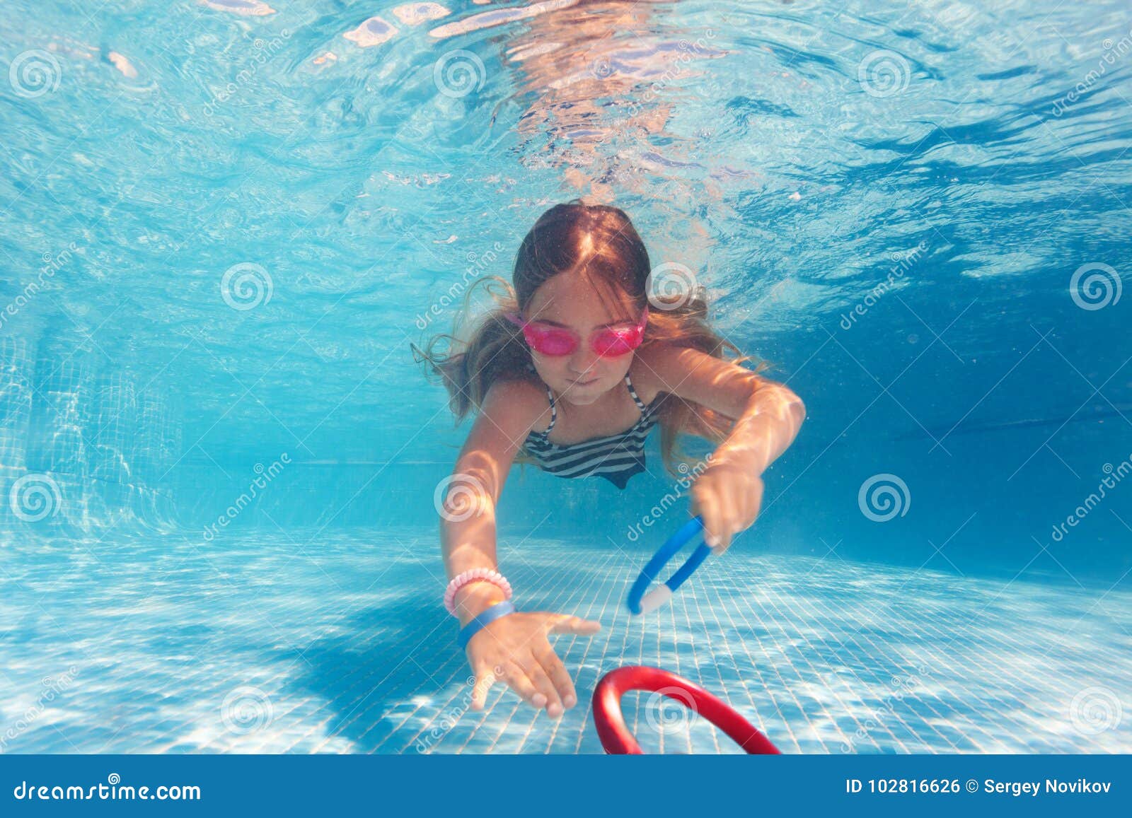 Preteen Girl in Pink Goggles Training Under Water Stock Photo ...