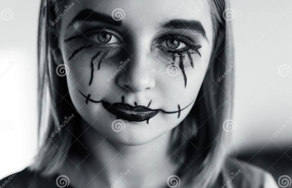 Preteen Girl with Spooky Halloween Makeup Stock Photo - Image of fear ...