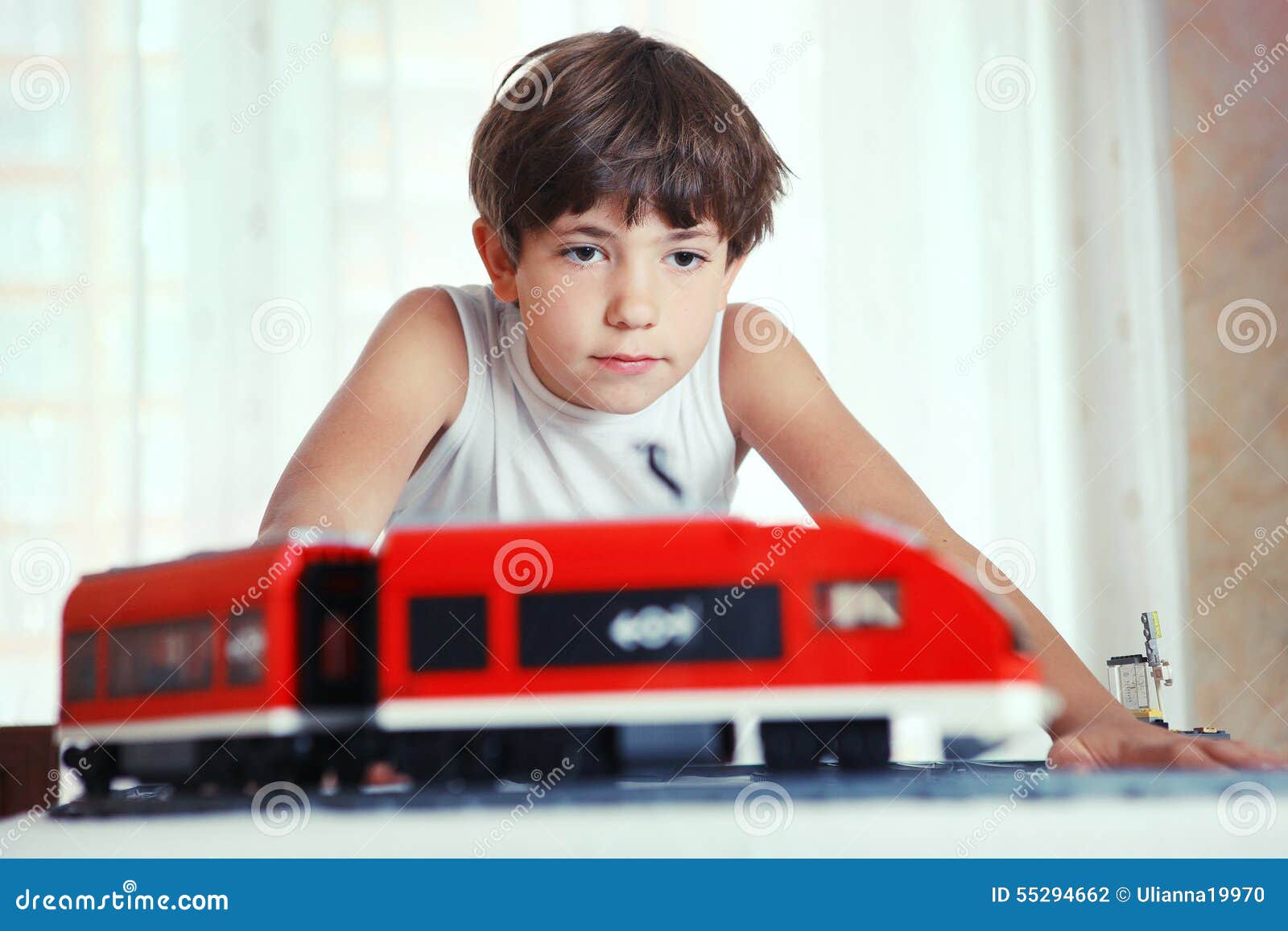 Preteen Handsome Boy Play With Meccano Toy Train An