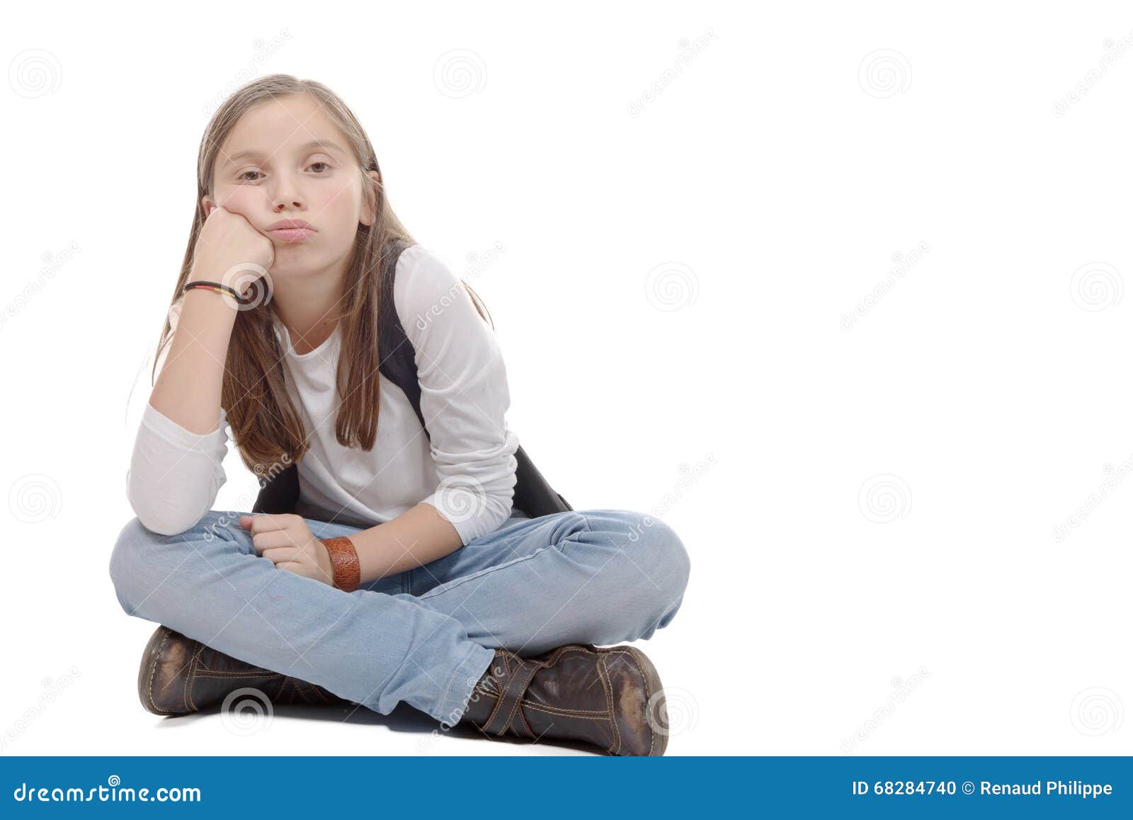 Preteen In Jeans Boots Hat And T Shirt Sitting On The Floor Stock 