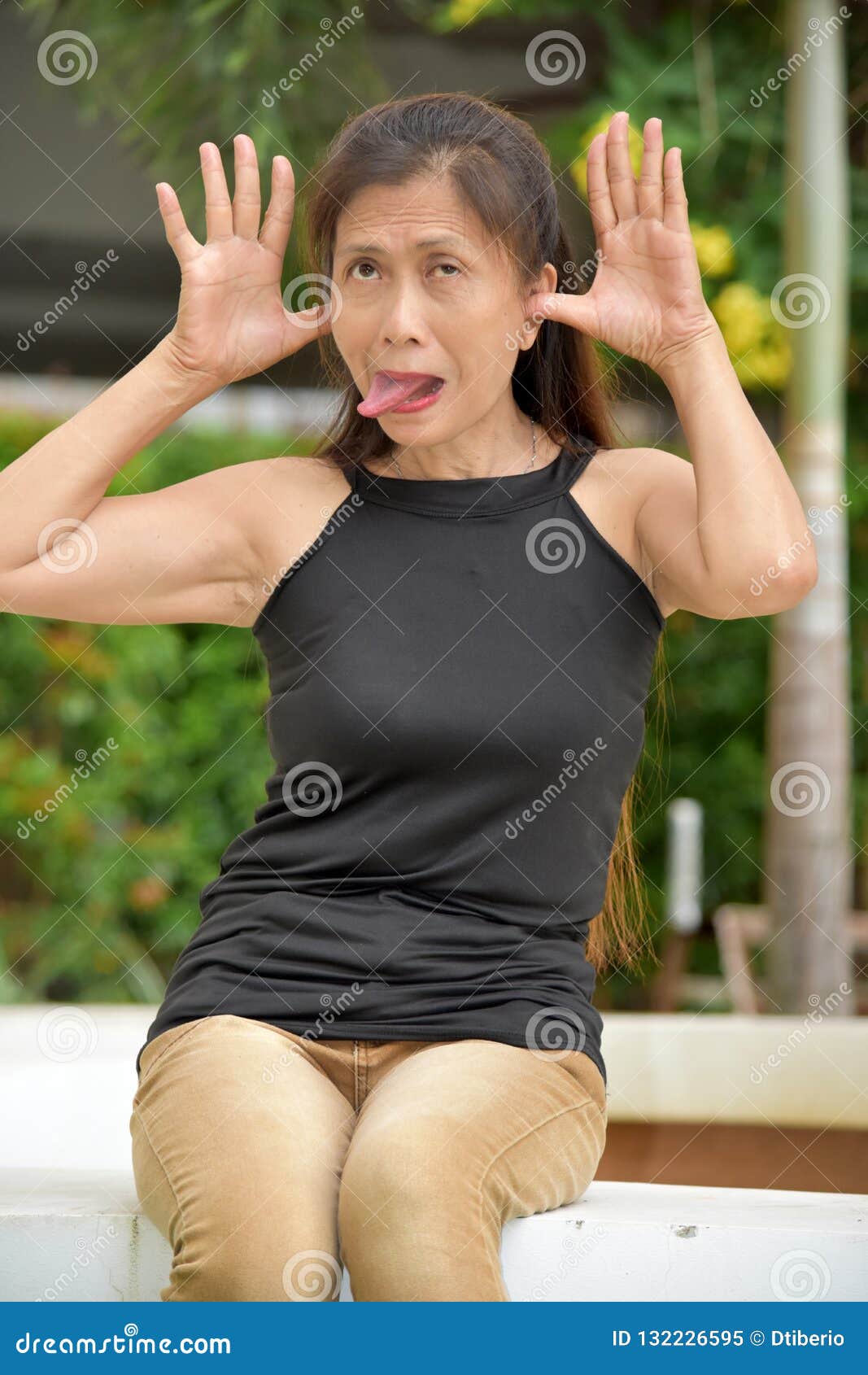 Filipina Adult Female Making Funny Faces Stock Image picture picture