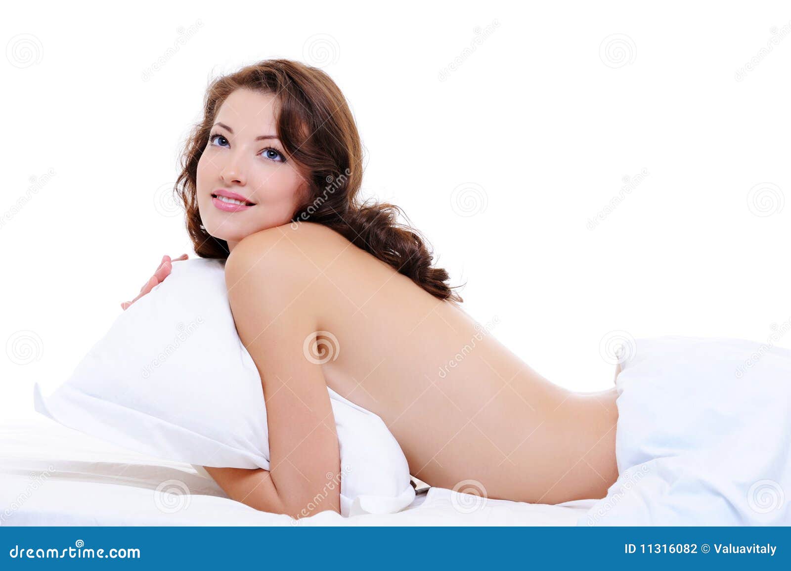 Pretty Adult Naked Girl Lying on Bed Stock Photo