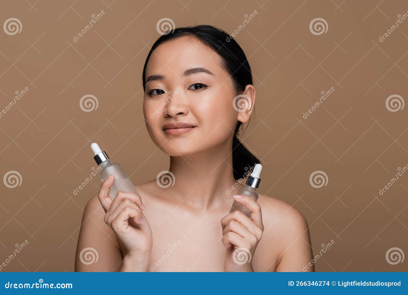 Pretty Asian Model with Naked Shoulders Stock Photo - Image of bottles