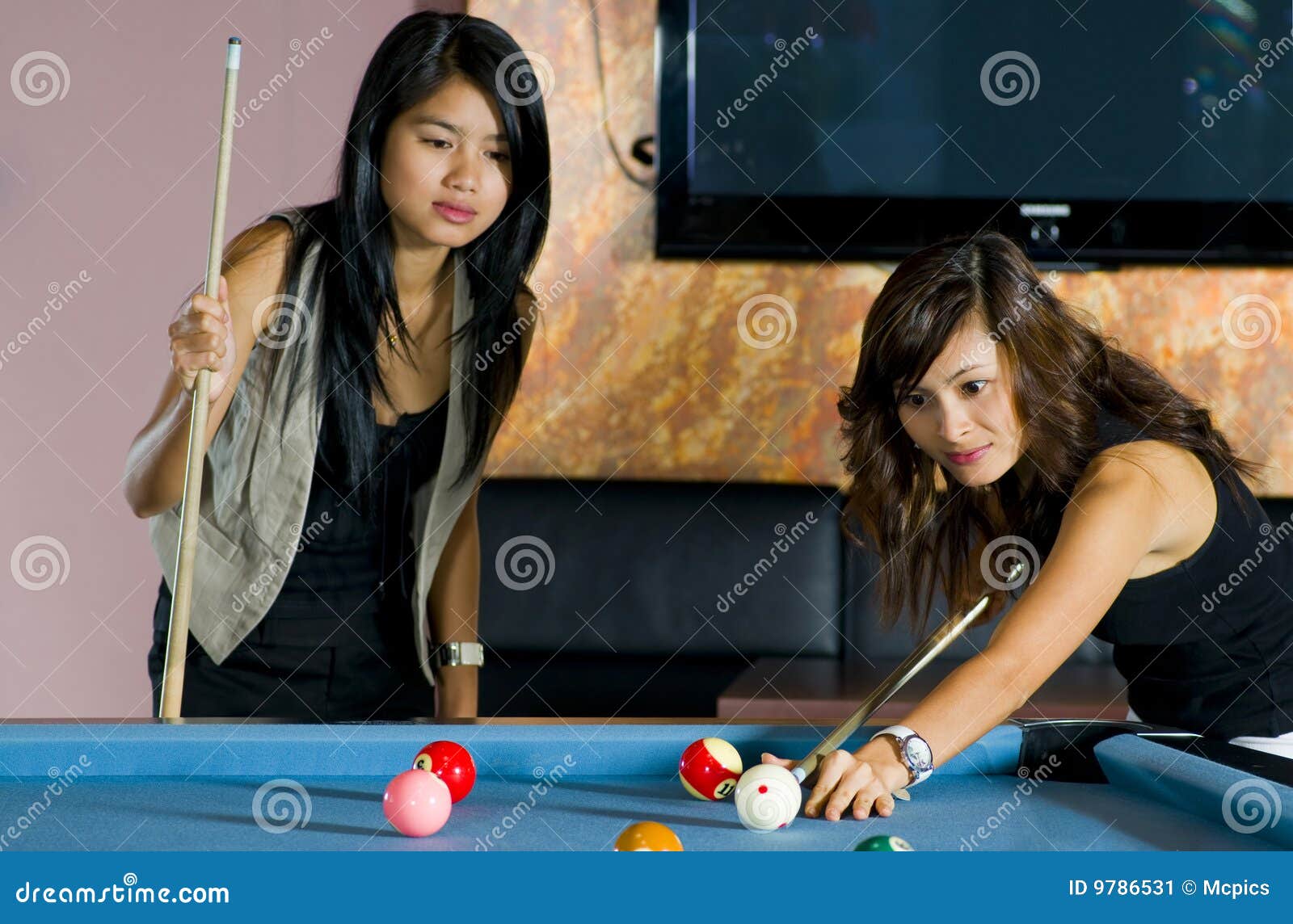 Pretty Asian Women Playing Pool Stock Image Image 9786531