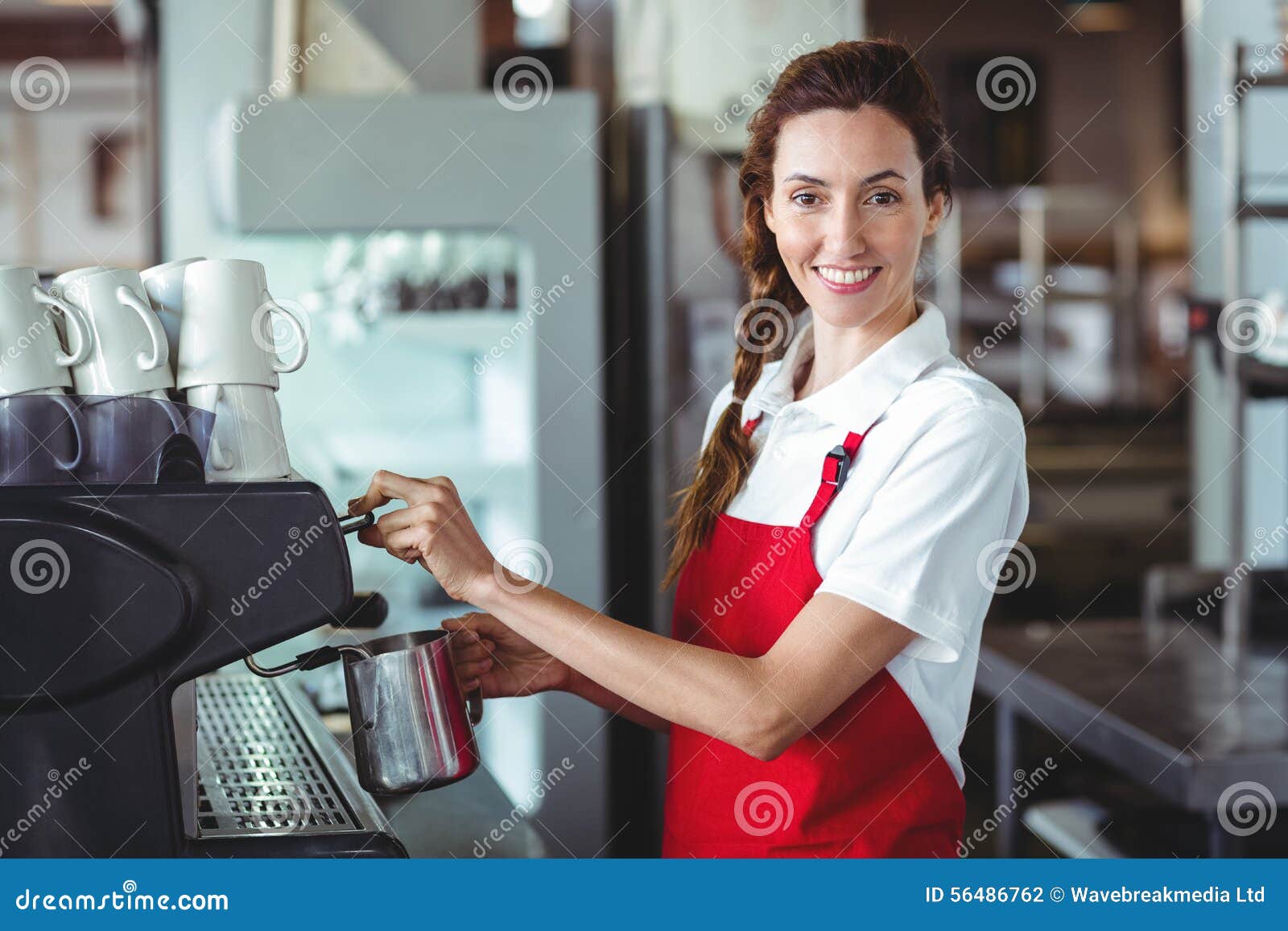 Pretty Barista Looking at Camera and Using the Coffee Machine Stock Photo Image of business