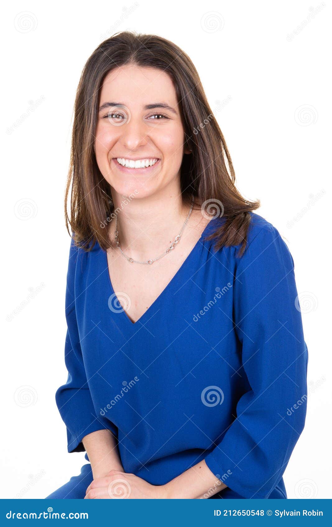pretty beautiful cheerfull slim smiling happy businesswoman sit in blue dress over white background