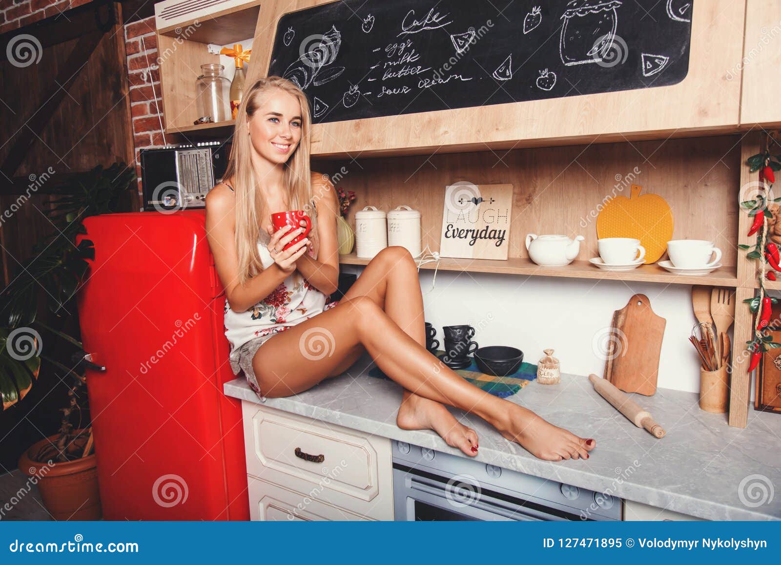 young woman drinking coffee and rejoicing at the new day