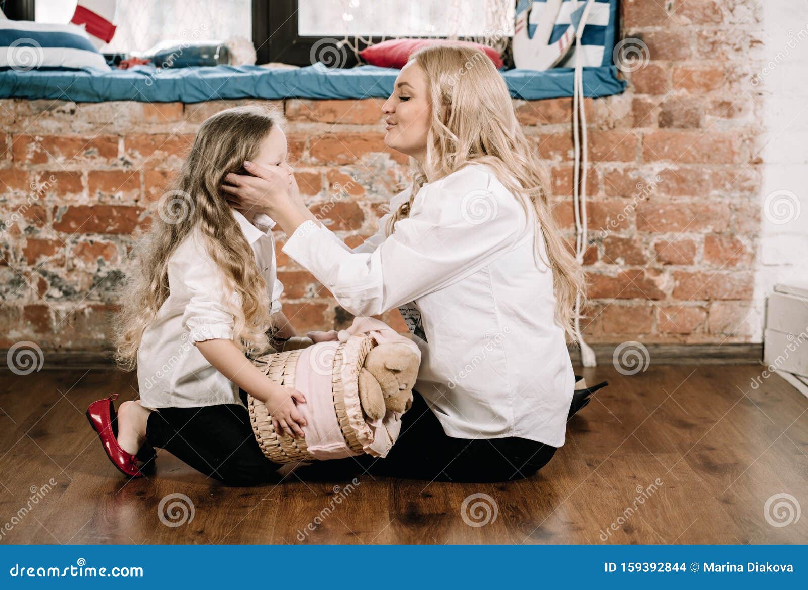 Young Asian mom and dad are unpacking gifts with their daughter Stock Photo  - Alamy