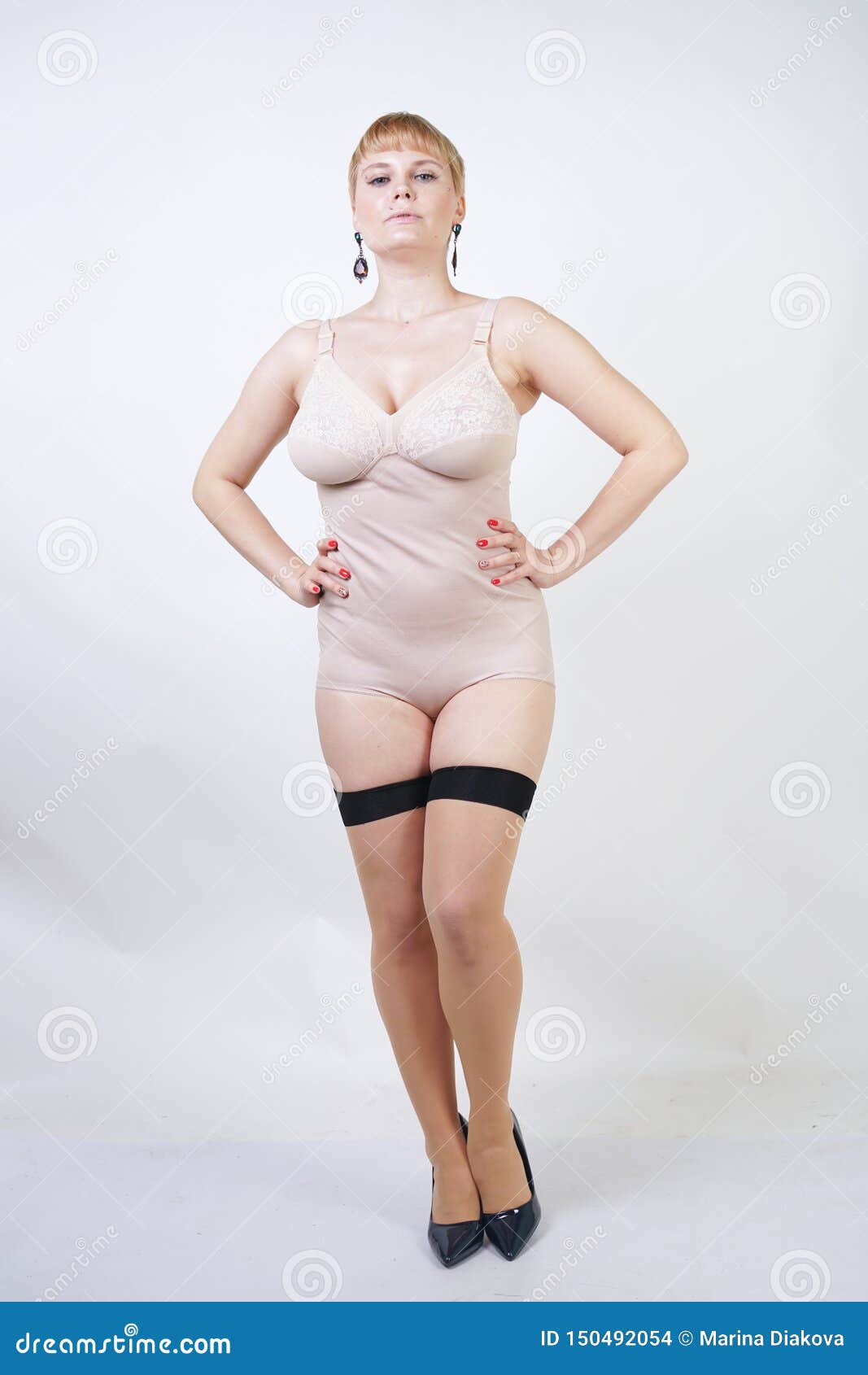 Pretty Blonde Short Hair Retro Woman with Curvy Body Posing in