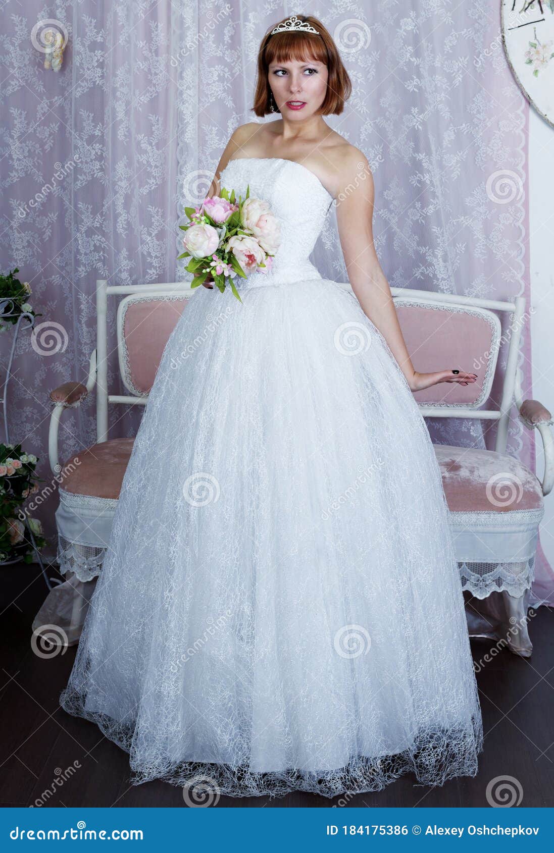 pretty bride posing in wedding dress