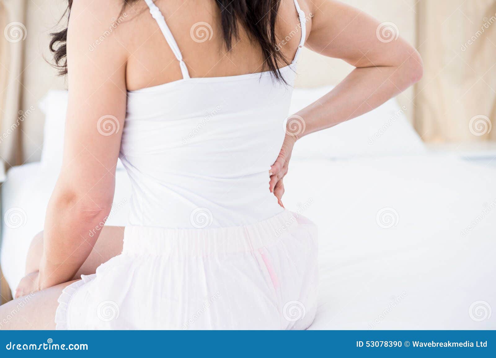 Pretty with Back Pain on Bed Stock Photo Image of homey, ache 53078390