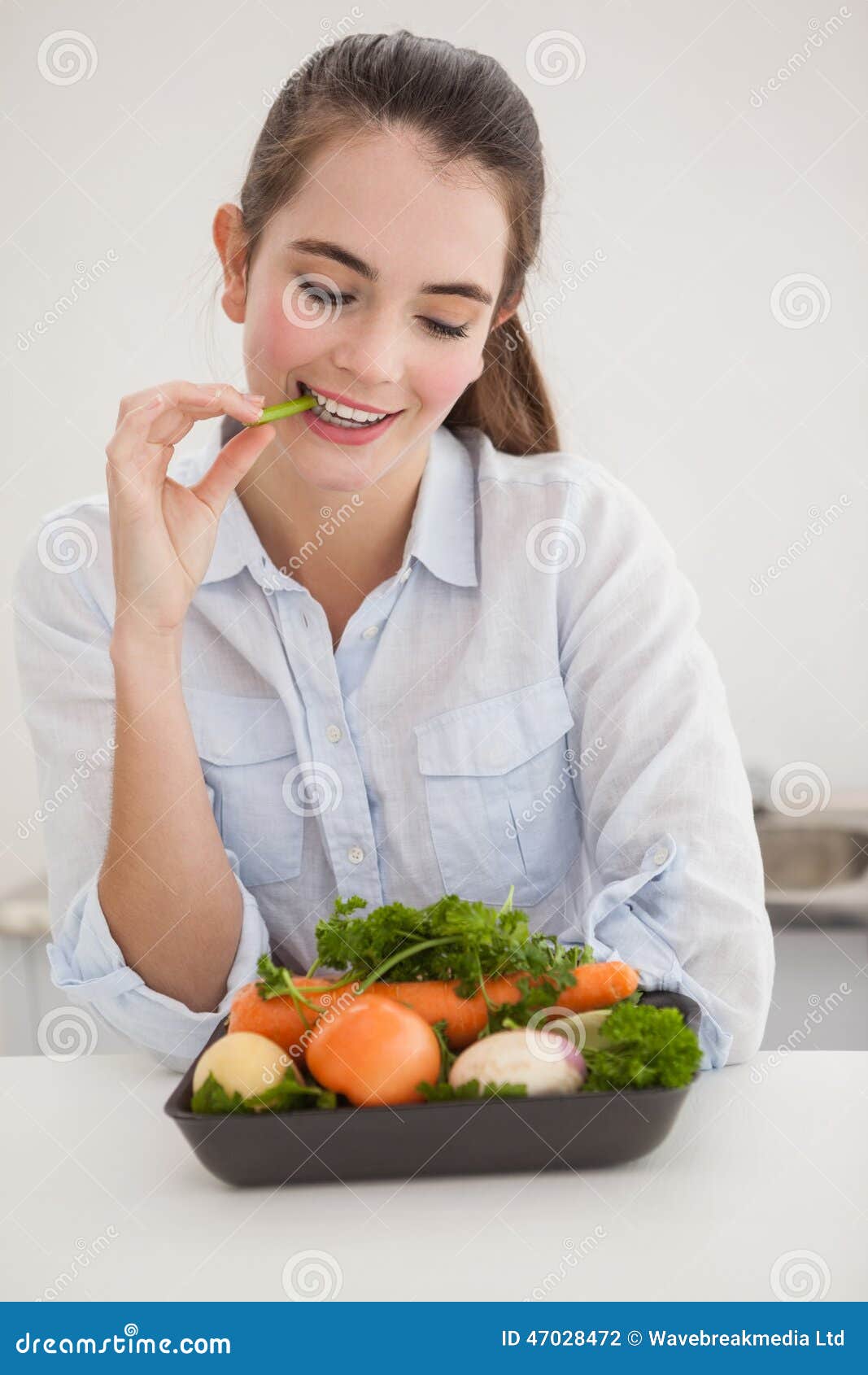 Pretty Eating Raw Vegetables Stock Photo Image of domestic