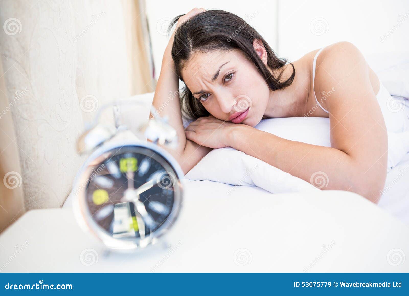 Pretty Watching Alarm Clock on Bed Stock Image Image of