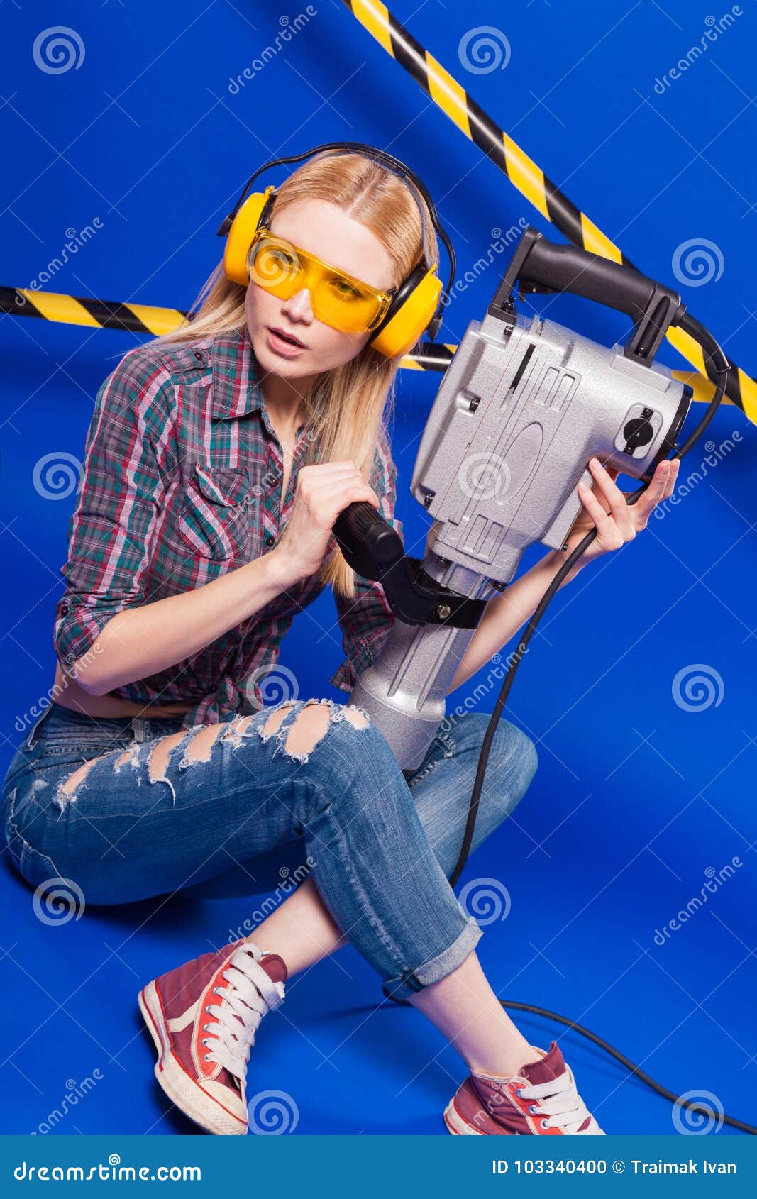 Pretty Builder Girl in Chechered Shirt, Jeans and Glasses Hold P Stock ...