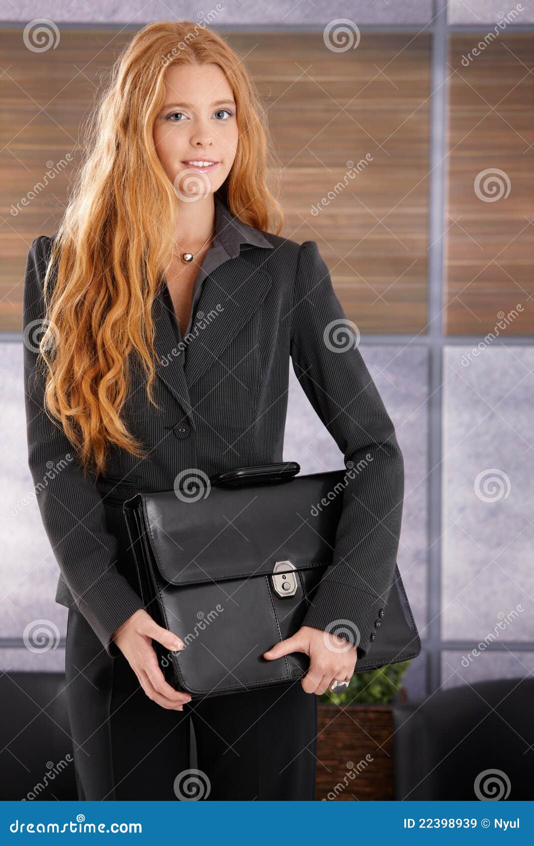Pretty Businesswoman with Briefcase Stock Image Image of haired, hallway 22398939