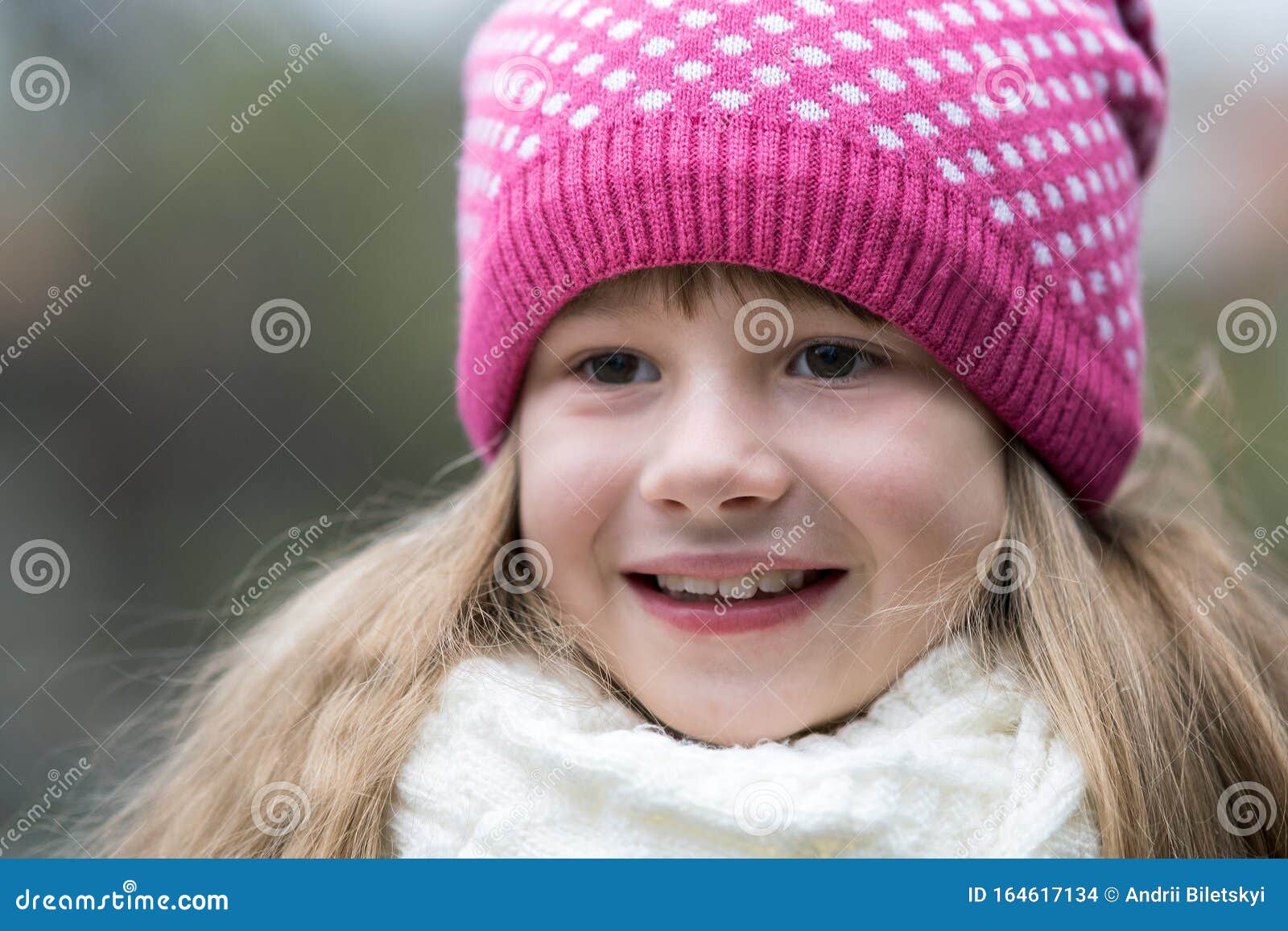 Pretty Child Girl in Warm Knitted Winter Clothes Outdoors Stock Photo ...