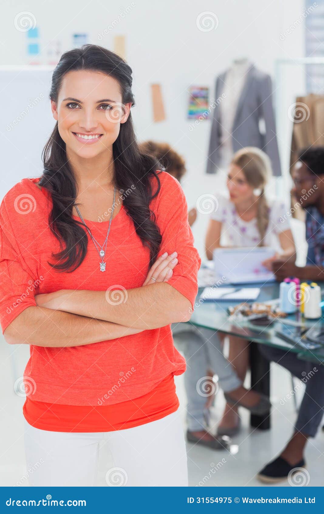 Pretty Fashion Designer with Arms Crossed in Bright Office Stock Image ...