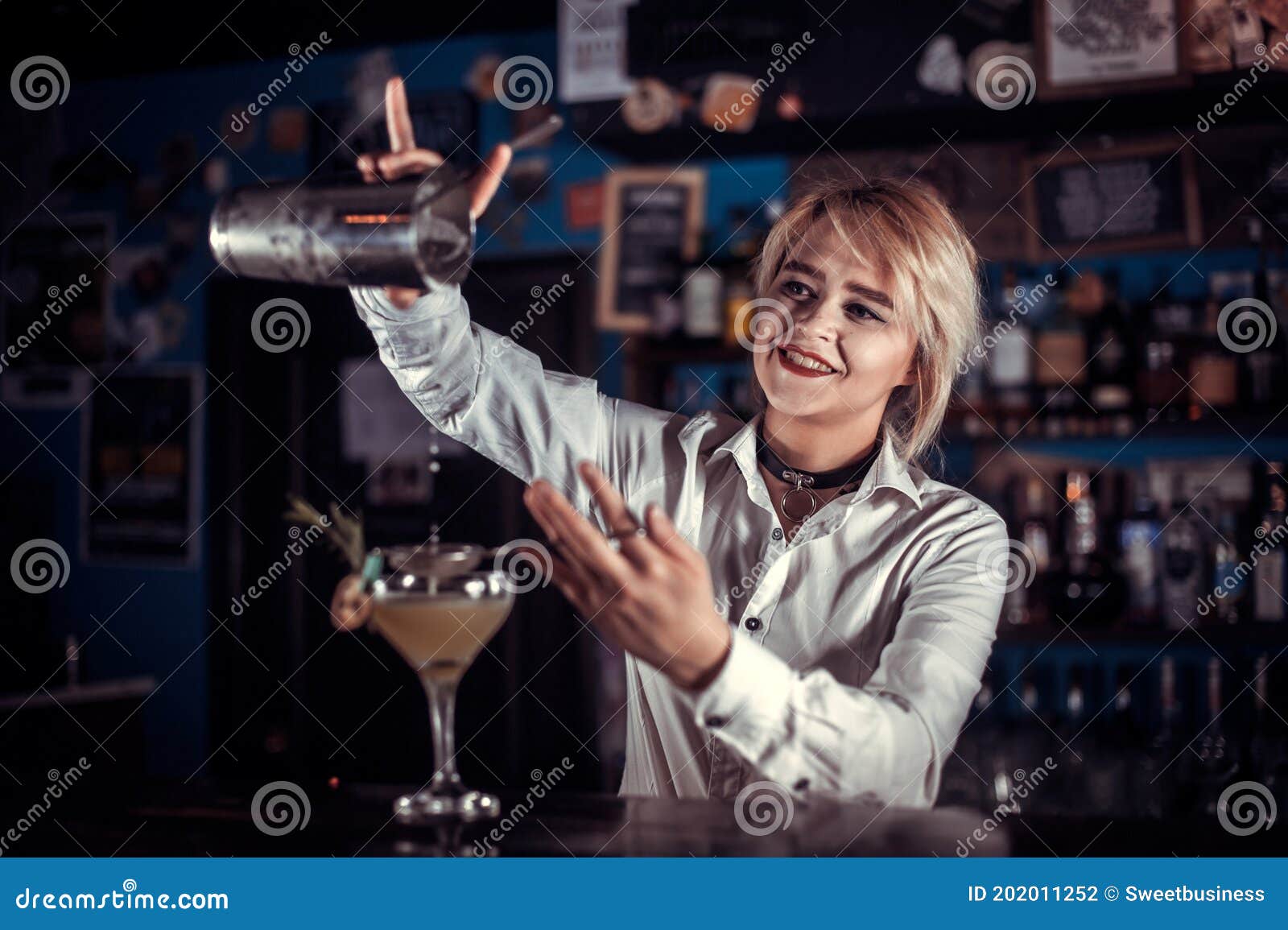 Pretty Girl Bartender Adds Ingredients To a Cocktail Behind Bar Stock ...