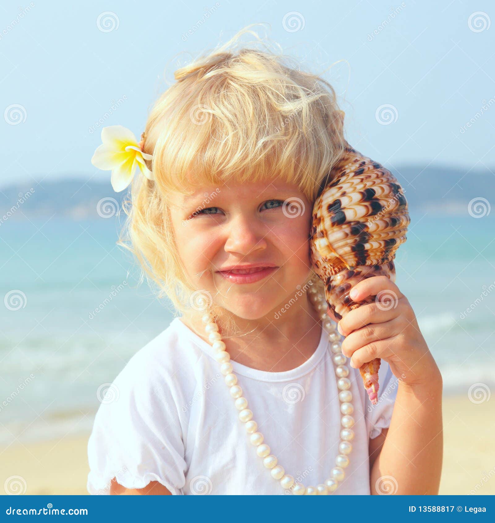 Pretty Girl on the Beach with Seashell Stock Image Image of beautiful