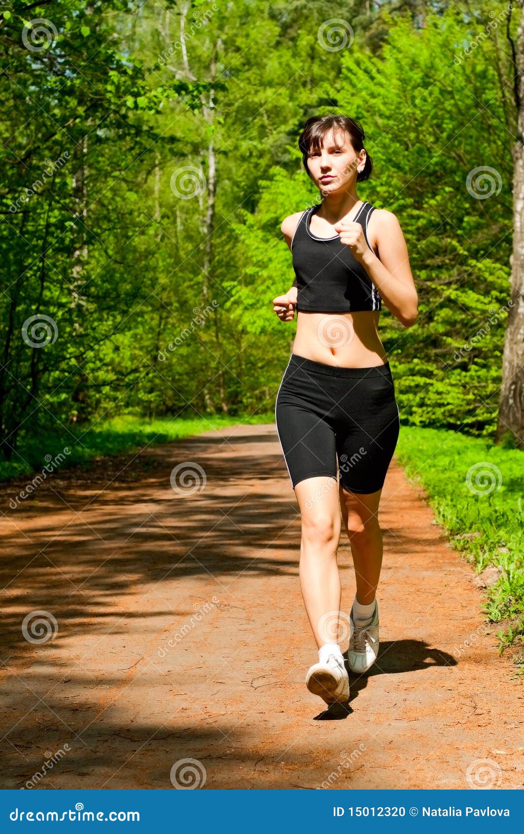 Pretty girl jogging stock photo. Image of person, grass 15012320