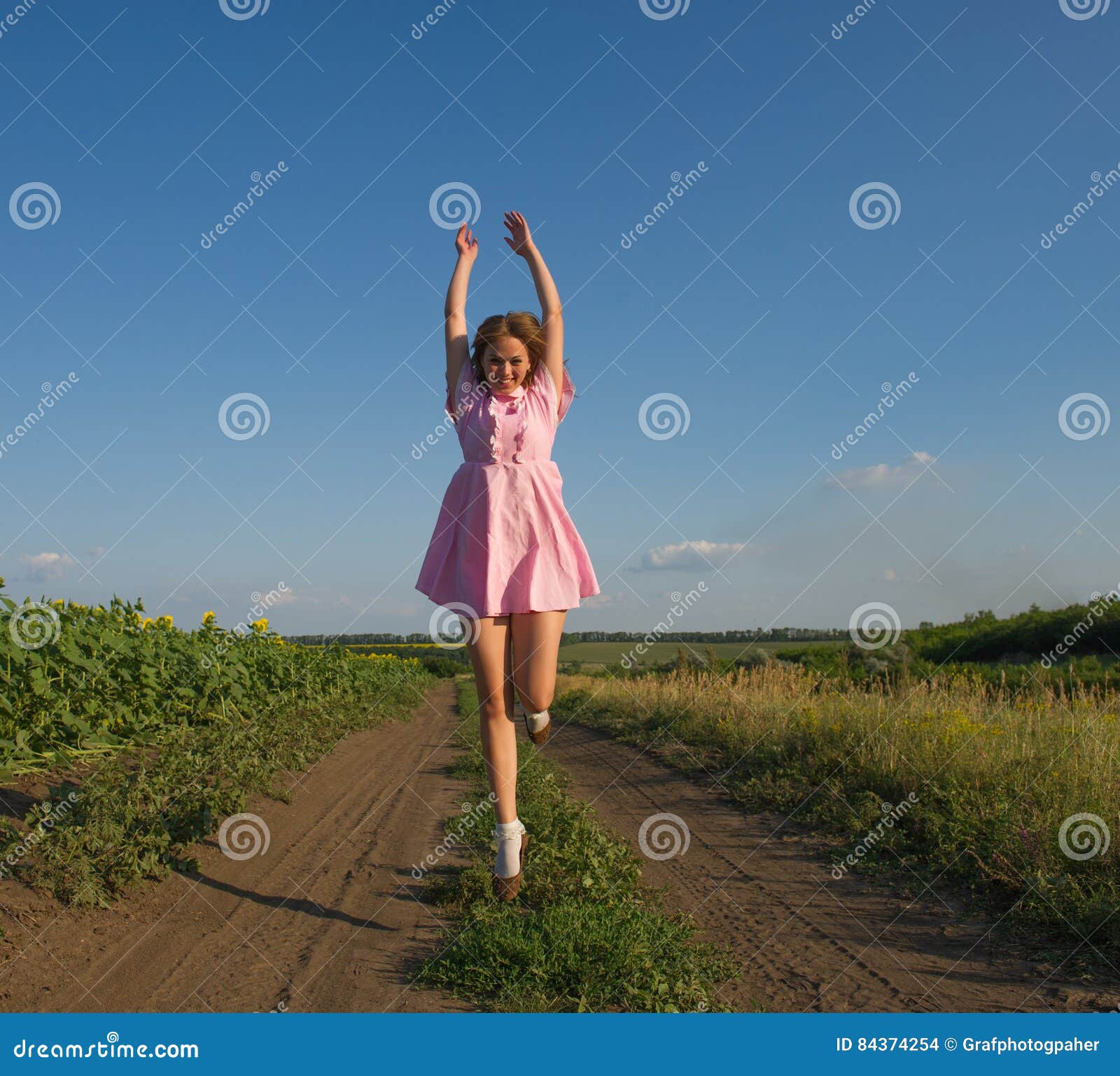 Pretty girl jumped stock photo. Image of happy, jump 84374254