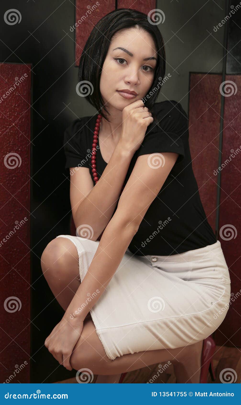 Pretty girl kneeling stock image. Image of female, cute 13541755