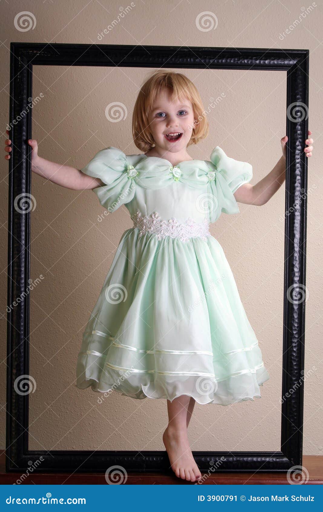 Pretty Girl in Picture Frame Stock Image Image of playing, looking 3900791