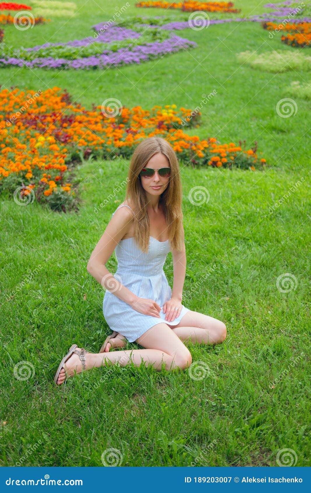 Pretty Girl in Short Blue Dress on Gras in Summer Park Stock Image ...