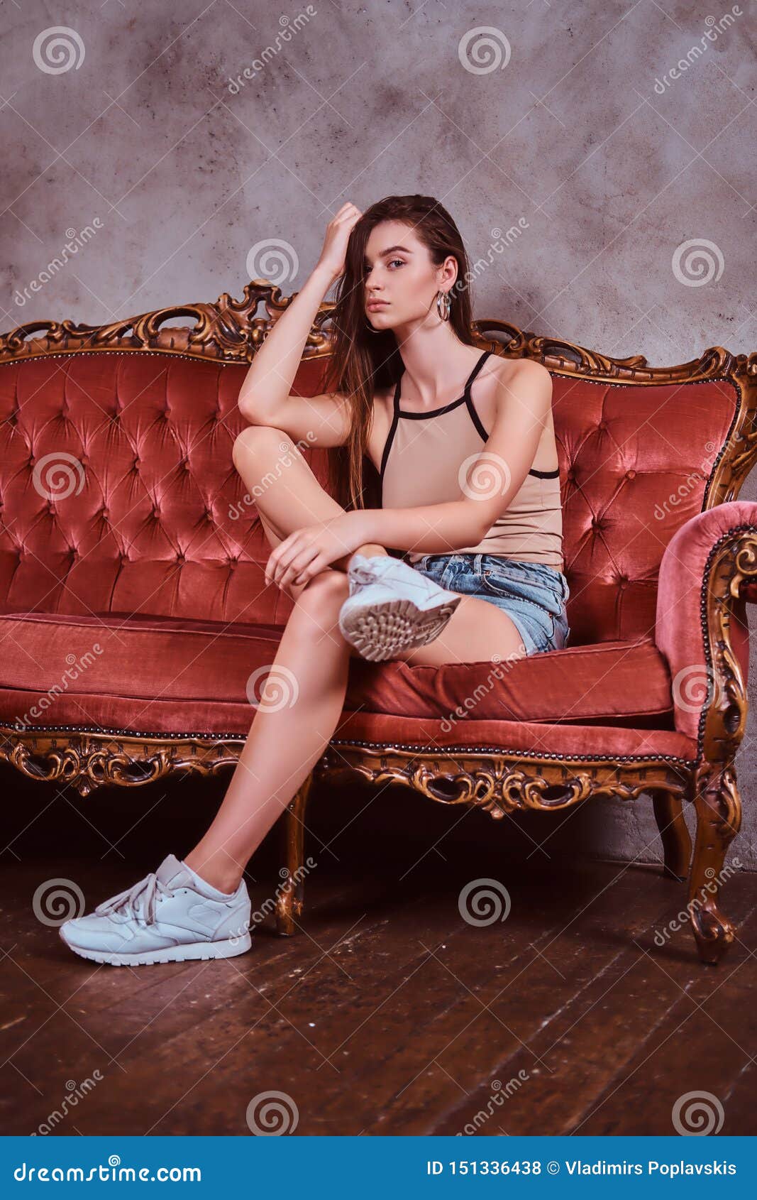 Sexy cow girl on the sofa
