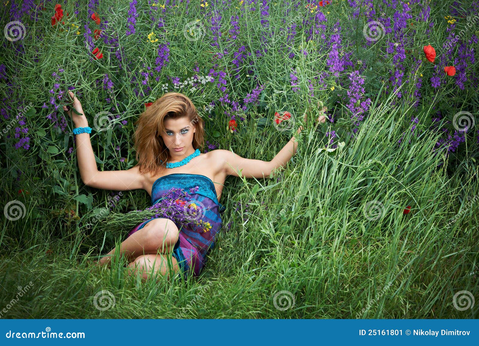 Pretty girl in spring meadow. Pretty young girl with swimsuit top in green spring meadow