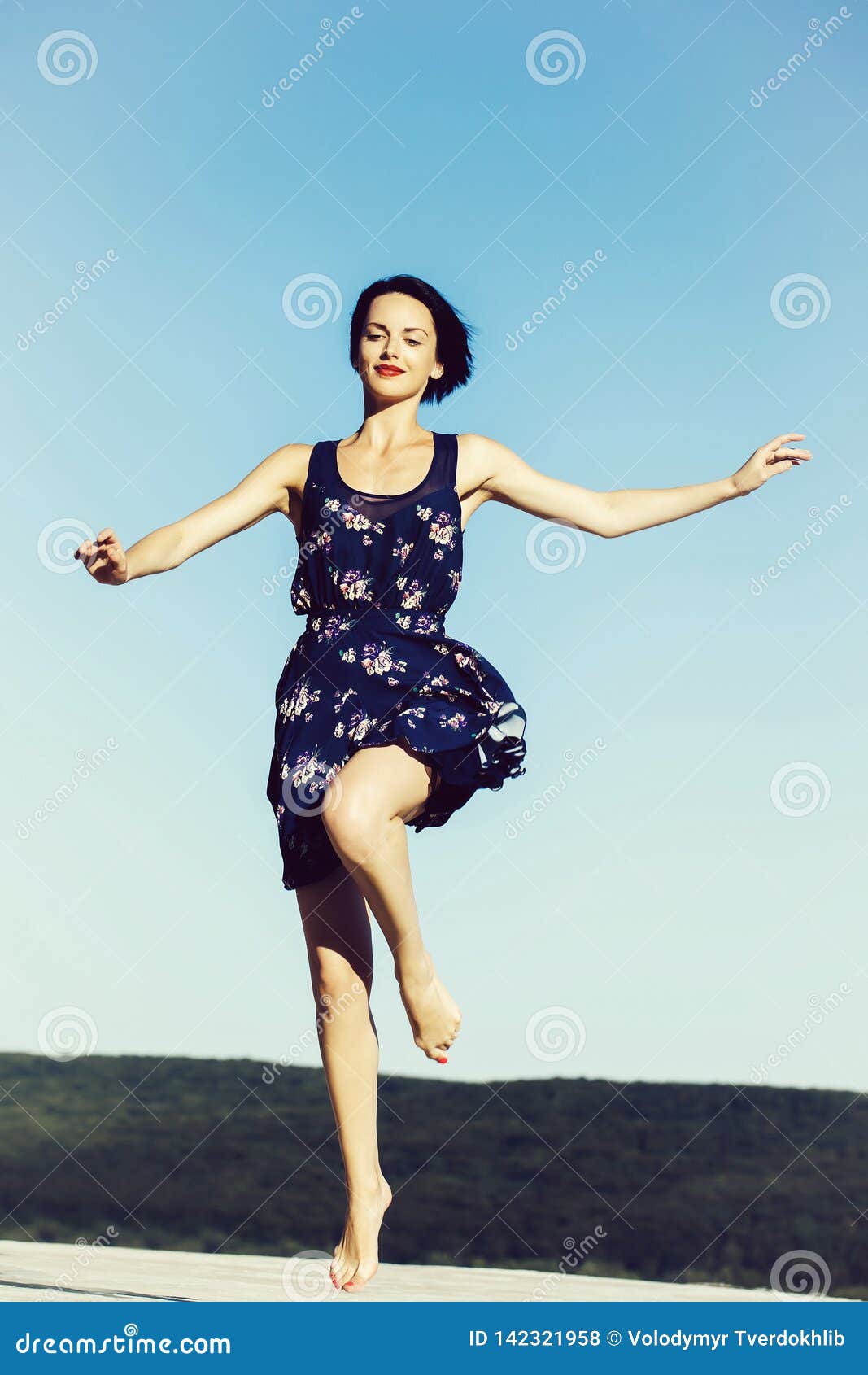 Pretty girl in blue dress stock photo ...