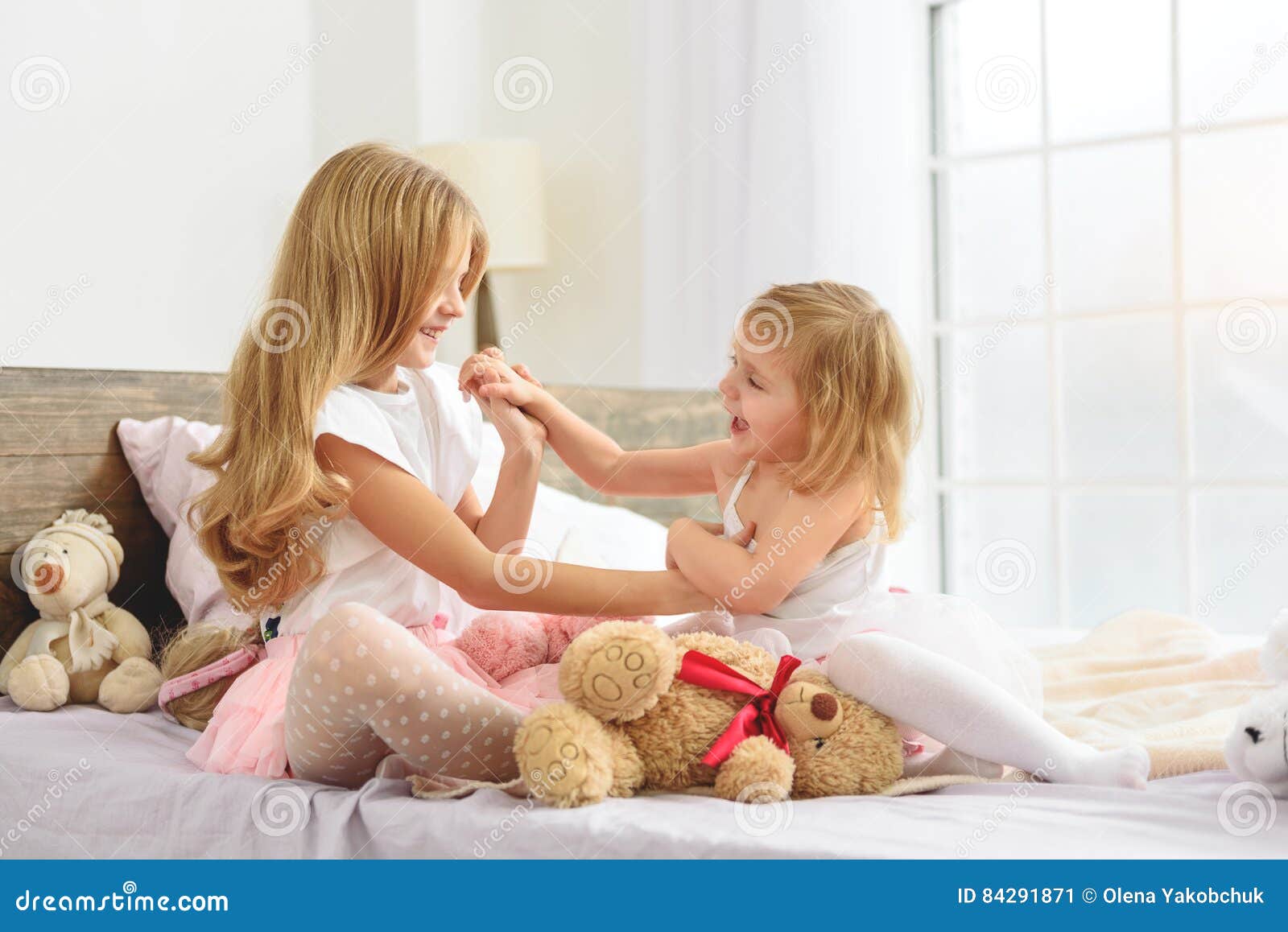 Pretty Girls Playing Together In Bedroom Stock Image Image Of Game