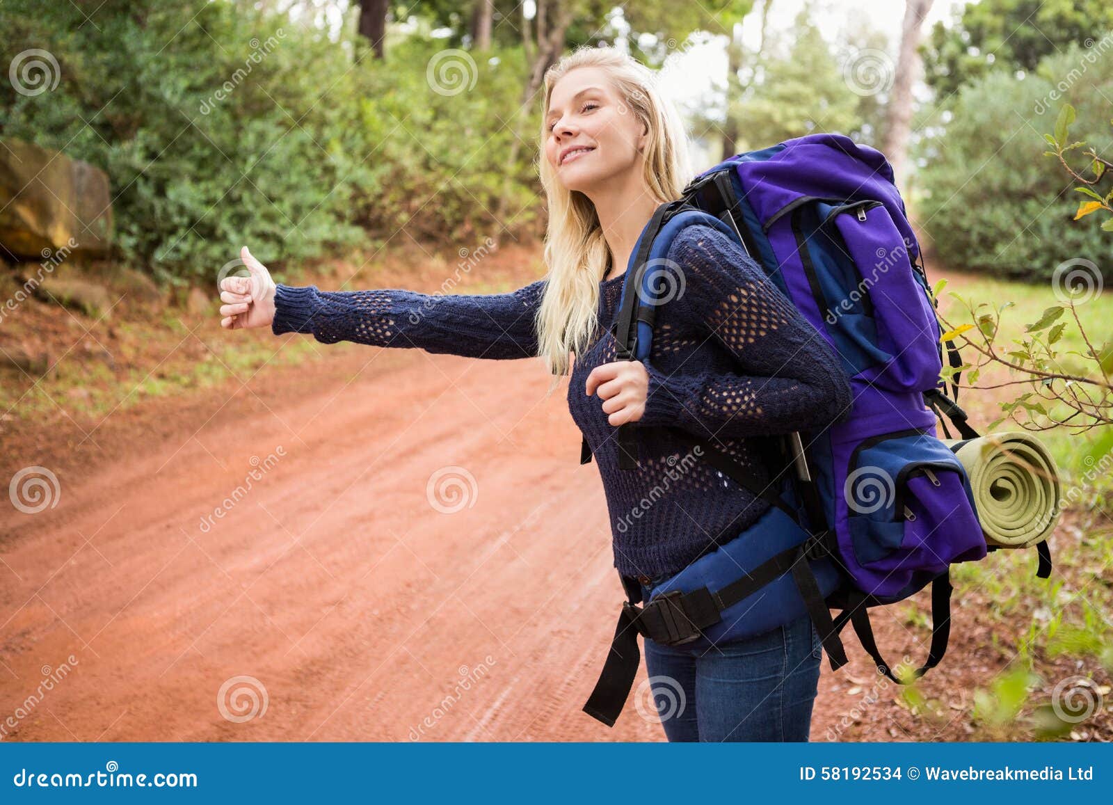 Pretty Hitchhiker Sticking Thumb Out Stock Photo Image of caucasian