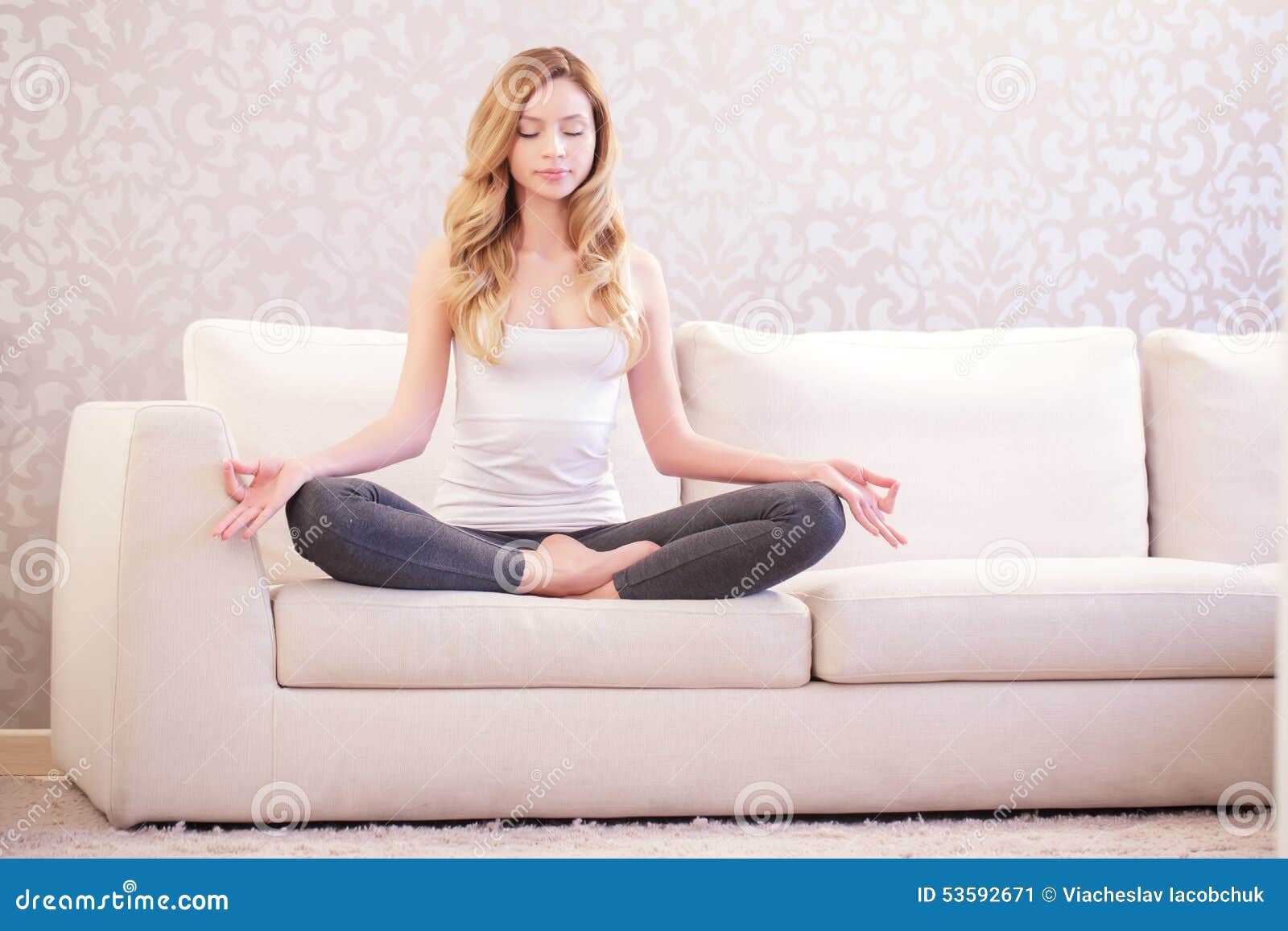 Pretty Lady Doing Yoga on Sofa Stock Image - Image of positive, peace:  53592671