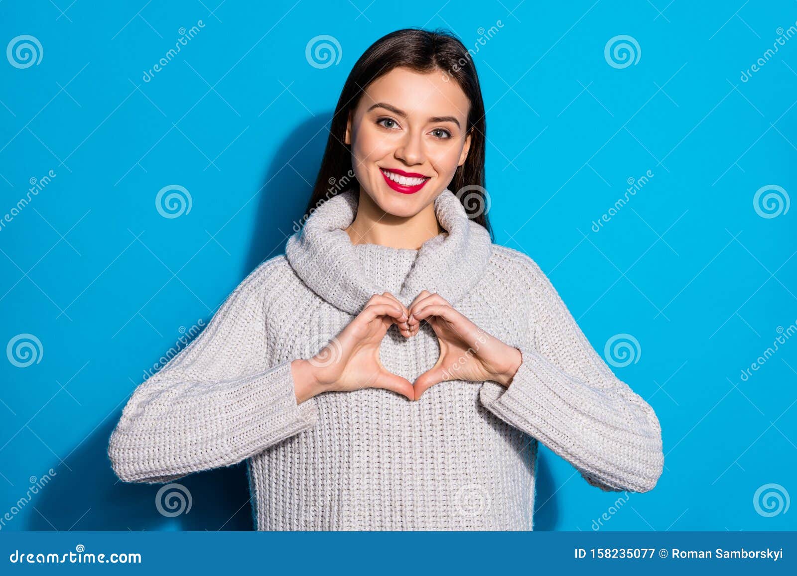 Pretty Lady Hold Arms in Heart Figure Wear Warm Knitted Pullover ...