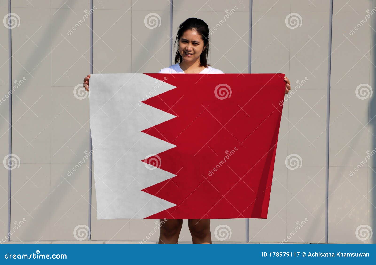 Pretty Lady Holding Bahrain Flag In Her Hands On Grey Background Stock Image Image Of Holding