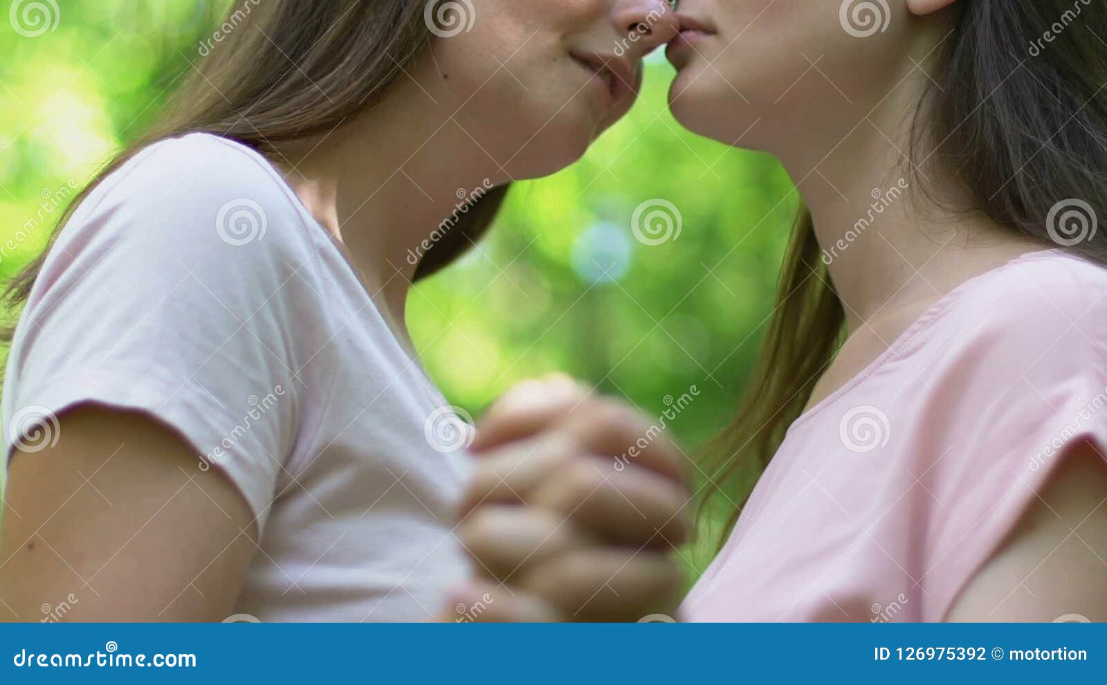 Pretty Lesbians Holding Hands And Kissing Each Other With Love Outdoors Closeup Stock Footage