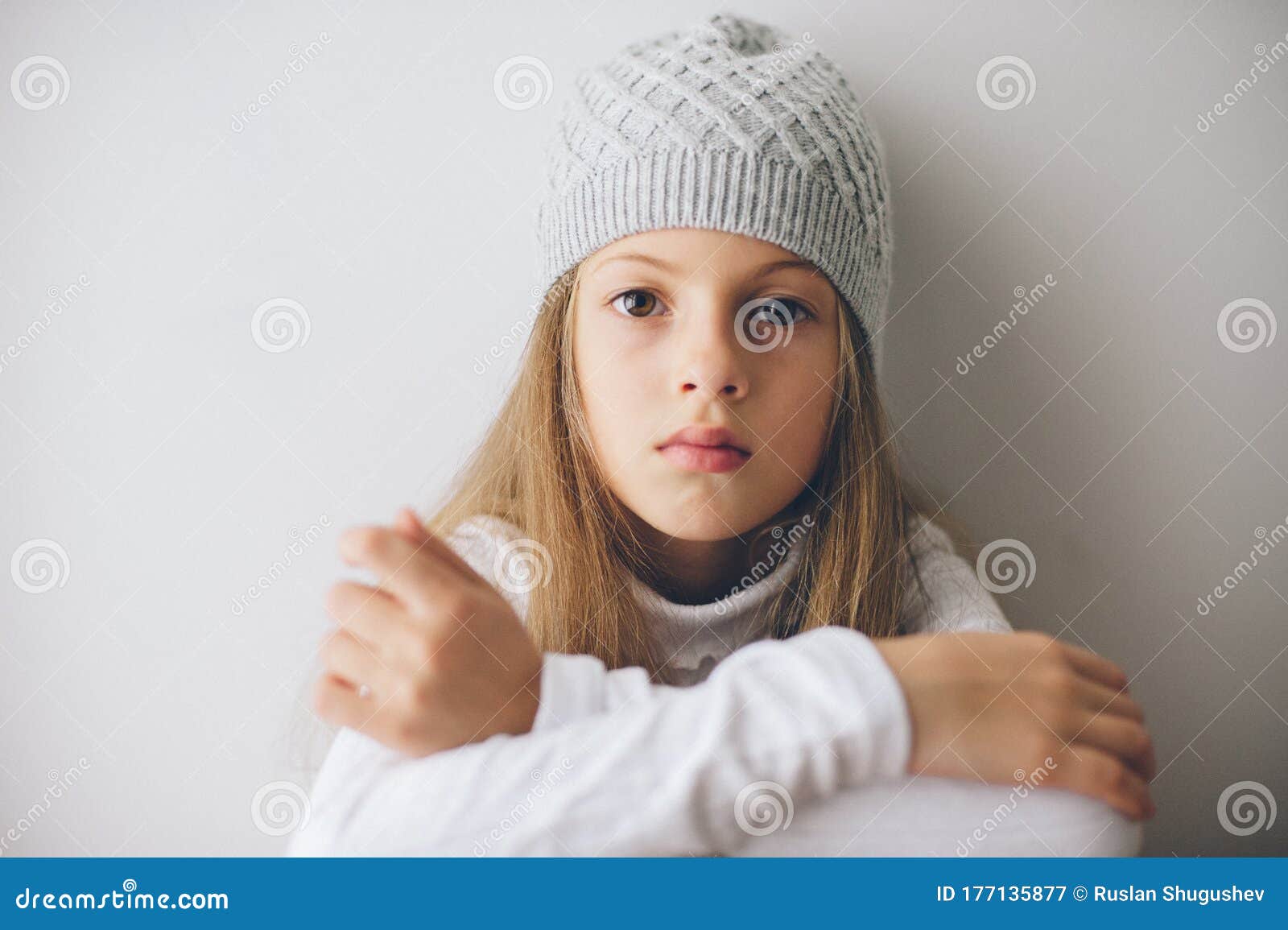 Pretty Little Caucasian Girl with Long Hair Wearing White Sweater and ...