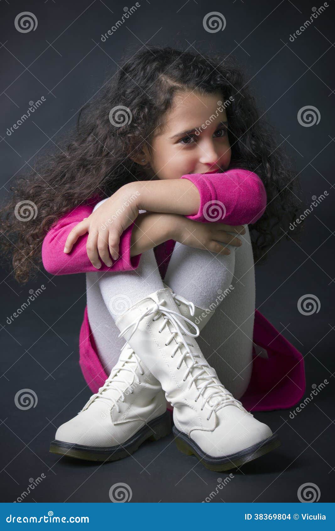 Pretty Little Girl Sitting On The Floor Stock Images 