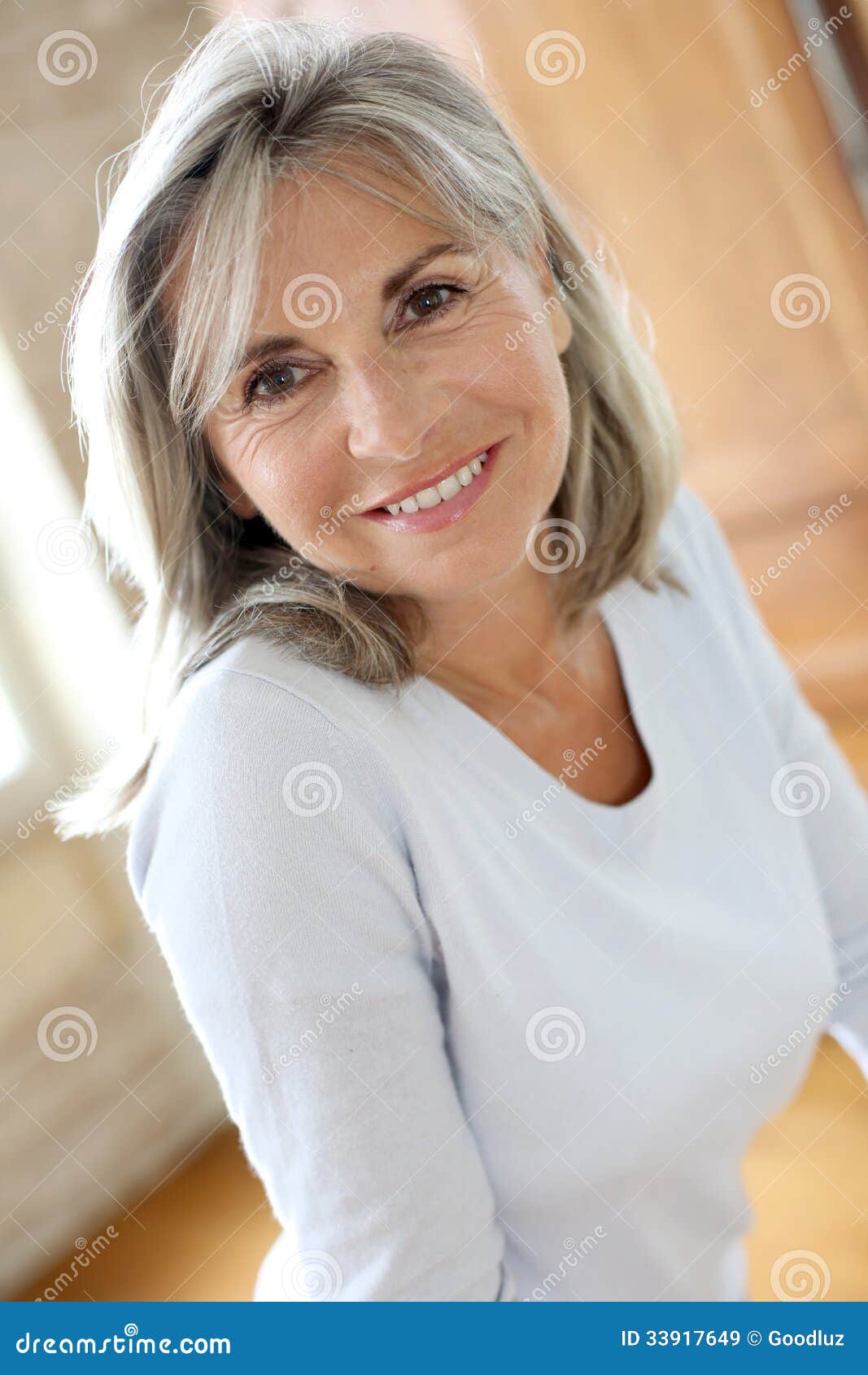 Pretty Mature Woman Standing At Home Stock Image - Image -3203