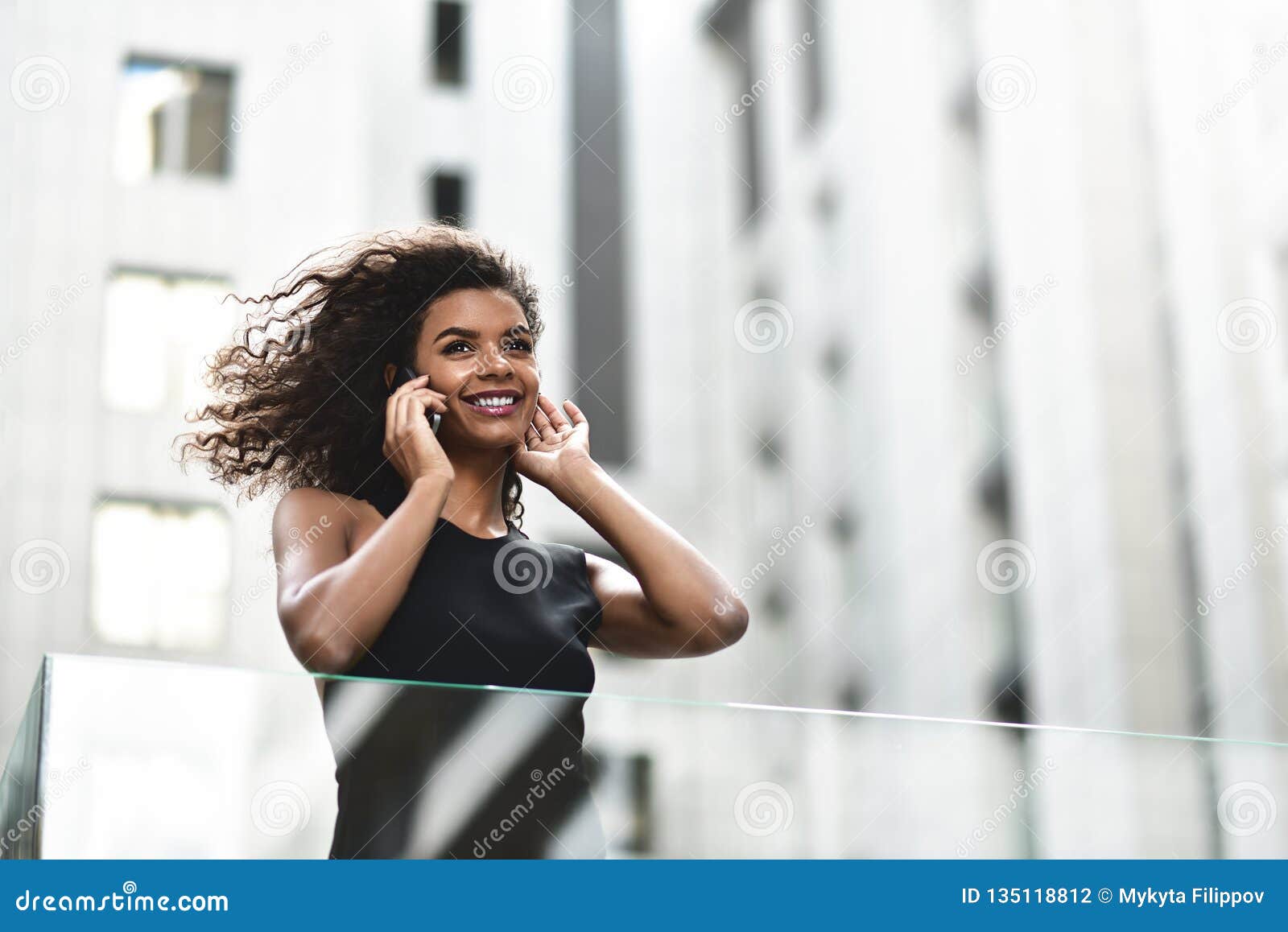 Pretty Mixed Race Businesswoman Speak by Phone in City Stock Photo ...