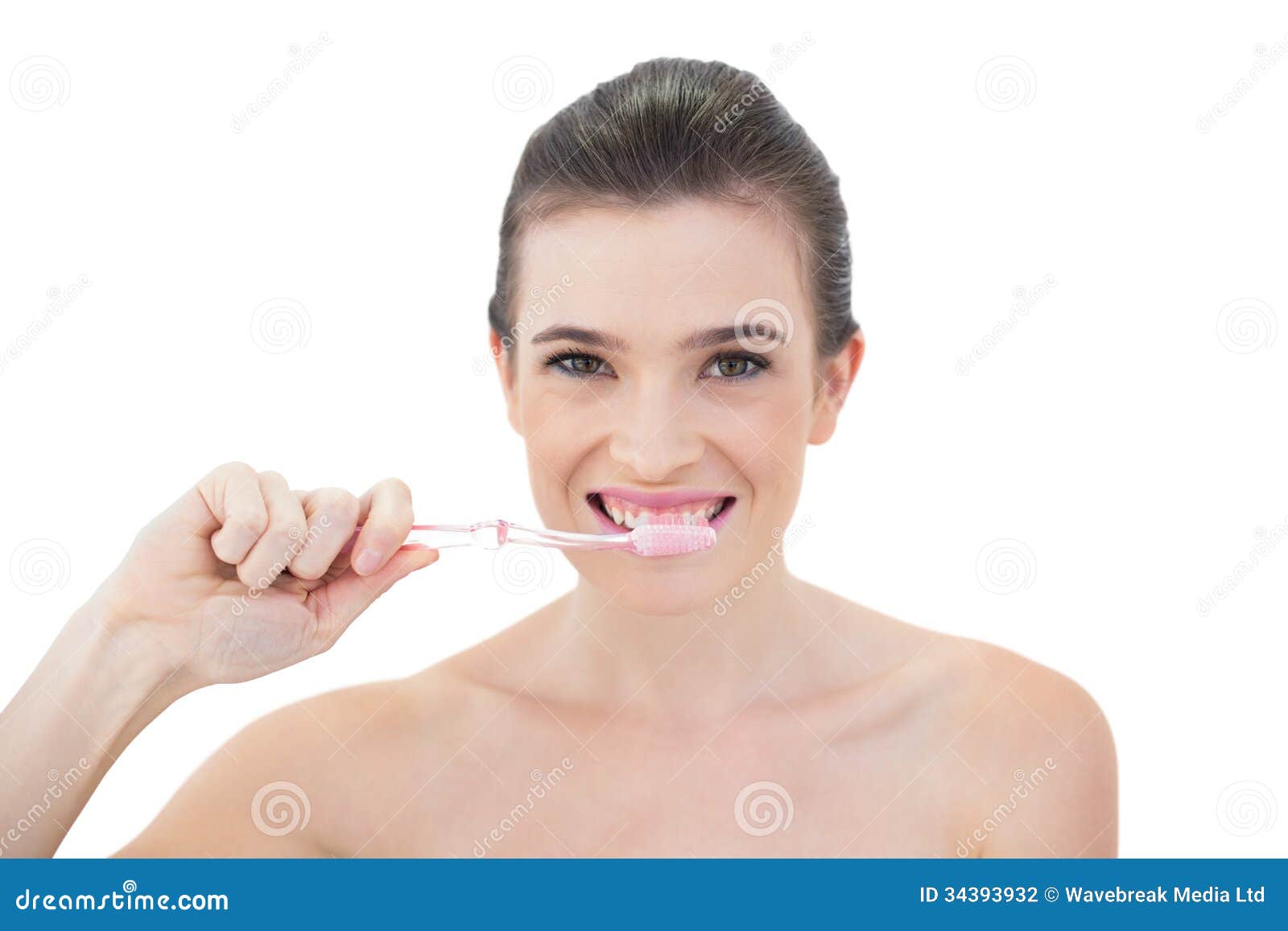 Pretty Natural Brown Haired Model Brushing Her Teeth Stock Photo